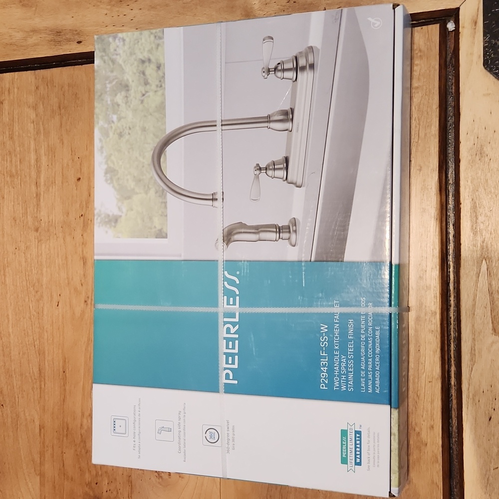 Peerless Two Handle Kitchen Faucet With Spray.